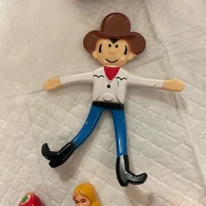 Cowboy Action Figure with Brown Hat and Blue Pants